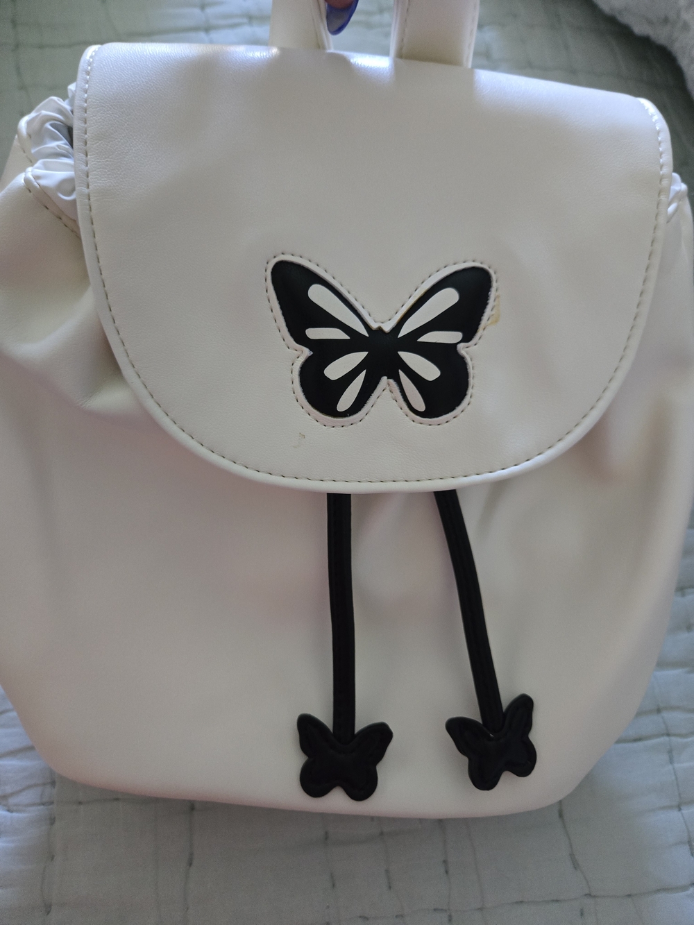 art class Cream Backpack with Black Butterfly Accent